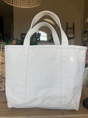 LL Bean boat and tote open top natural. Medium with regular handles.